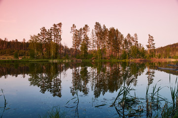 Lake with forest reflection/