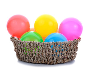 Fototapeta na wymiar Colorful plastic toy balls in basket