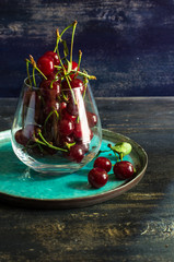 Fresh cherry on rustic background