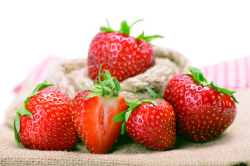 Fototapeta na wymiar Strawberries on burlap cloth