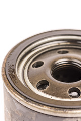 Macro close up car oil filter over white background