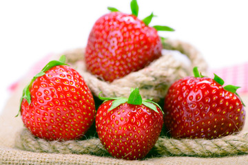 Strawberries on burlap cloth