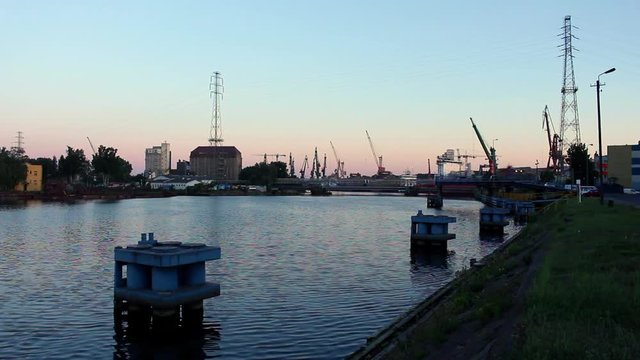 Shipyard harbor ship terminal at sunset