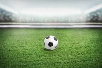 Obraz premium Stadion sportowy w świetle reflektorów