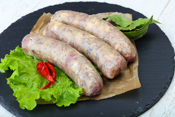 Raw sausages for cooking