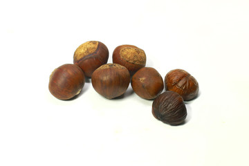 Fresh chestnuts isolated on white
