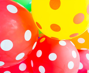 close-up colorful balloons with happy