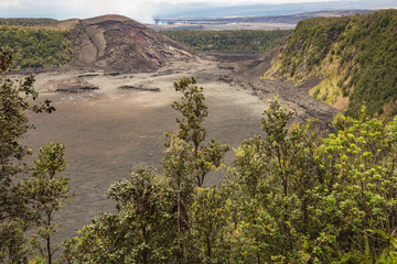 View into the Kilauea Iki Crater. In the background is the Kilauea Caldera visible.