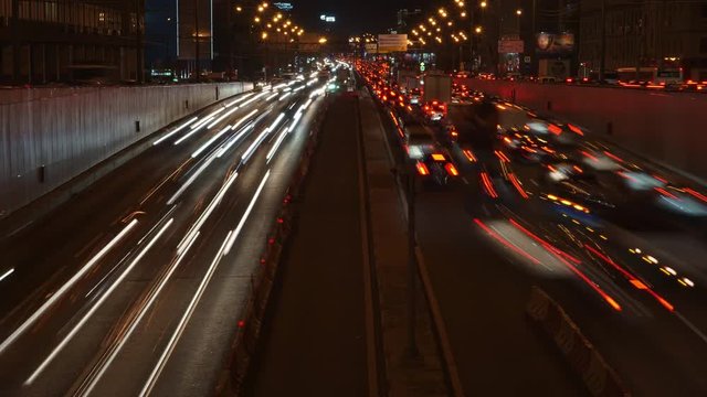 Long exposure night time lapse of urban traffic jam (4K available)