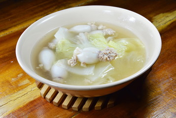 boiled minced pork stuffed squid with Chinese cabbage hot soup in bowl