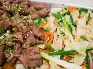 Beef with vegetables on hot plate
