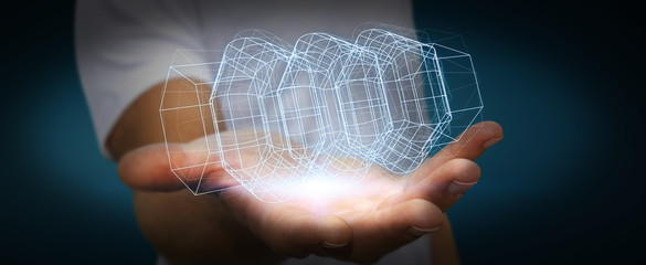 Businessman holding digital 3D engine