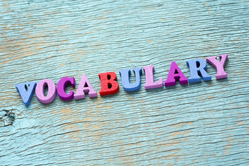 Word vocabulary on vintage wooden background