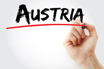 Hand writing Austria with marker, concept background