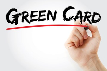 Hand writing Green Card with marker, concept background