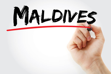 Hand writing Maldives with marker, concept background