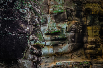 Fototapeta na wymiar statue Bayon Temple Angkor Thom, Cambodia. Ancient Khmer architecture.