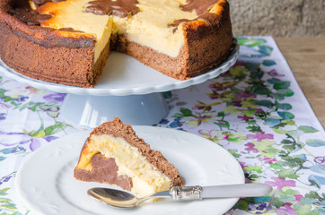 Cheesecake with chocolate and vanilla.