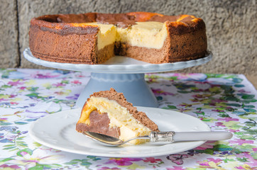 Cheesecake with chocolate and vanilla.