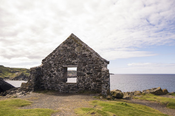 Moray Firth coast viewed through wall of ruin