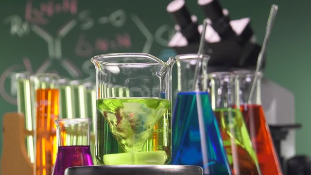 magnetic stirrer at work with yellow liquid beaker