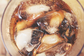 Cola with ice cubes