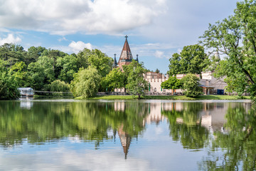 Fototapeta na wymiar Franzensburg Castle and pond in Laxenburg castle gardens near Vienna, Lower Austria