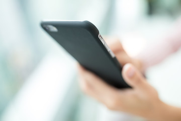 Woman hold with cellphone