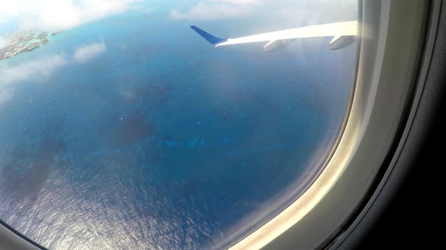 Aerial view from the airplane to the Ocean