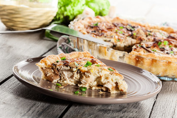 Slice of tart with chicken amd mushrooms