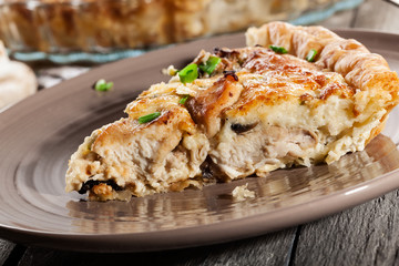 Slice of tart with chicken amd mushrooms