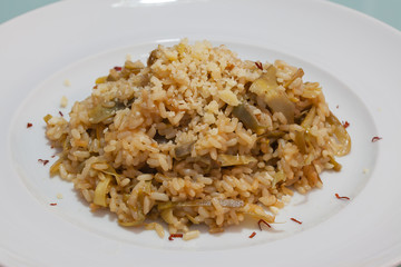 Brown rice with carciofi and cheese.