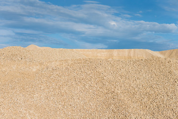 Fototapeta na wymiar limestone in the development of rock on background of blue sky