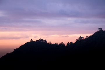 Sunset on mountain view on foothills 
