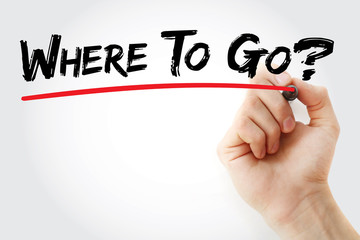 Hand writing Where To Go? with marker, concept background
