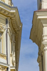 Fototapeta premium The roof of the building with beautiful old architecture in Art Nouveau Style against the sky