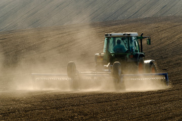 Fototapeta premium Agricultural tractor working