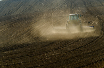 Fototapeta premium Agricultural tractor working