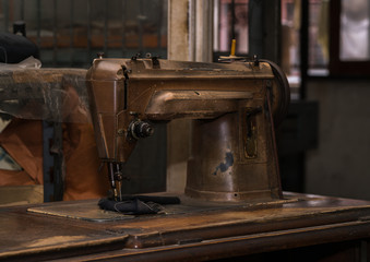 Old sewing machine in retro style
