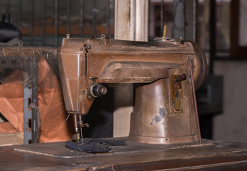 Old sewing machine in retro style
