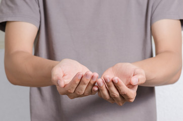 Man offer hand and holding nothing