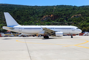 aircraft was taxiing to the runway at the airport of Rhodes sunny day