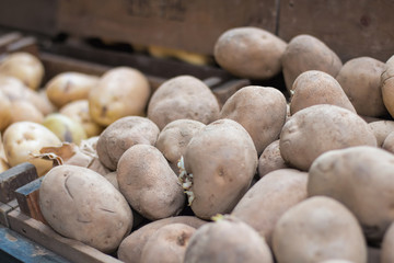 Potatoes For Sale At Market Stall