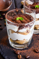 Tiramisu in glass . Traditional italian dessert.