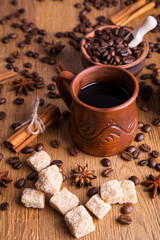 Fototapeta na wymiar grains of black coffee and black coffee