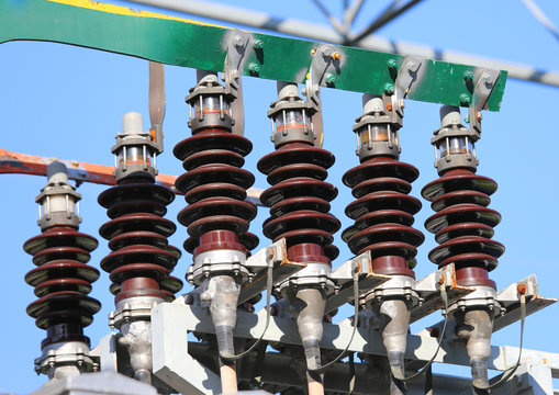 big copper busbar with high-voltage cables in an electric power