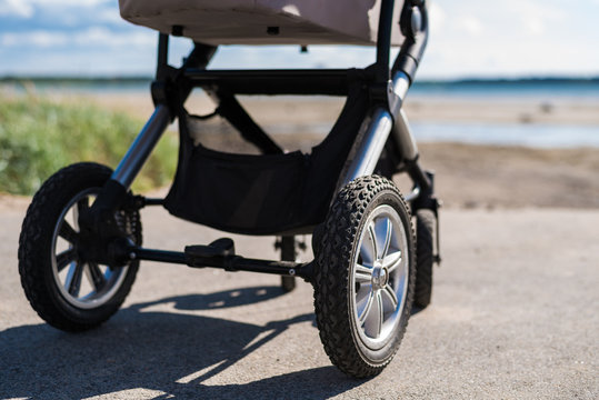 Baby stroller on beach