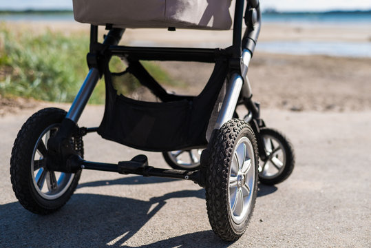 Baby stroller on beach
