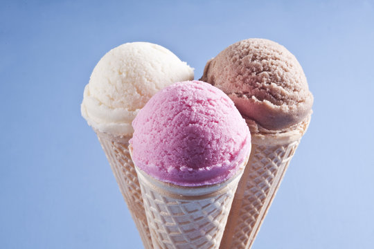 Various ice cream cones are together.