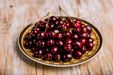 Fresh cherries on plate